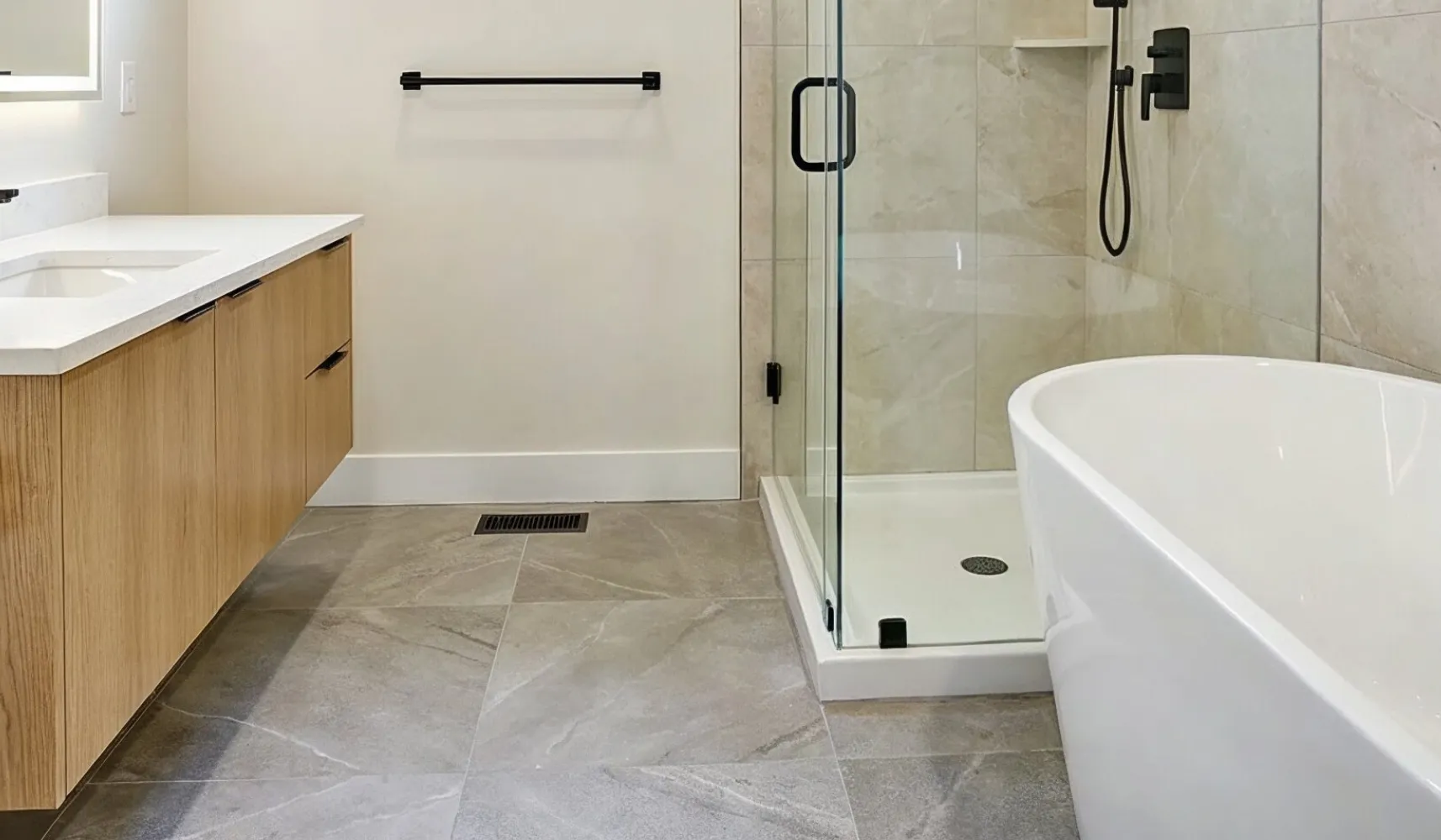 Bathroom remodeling project in Los Angeles with a modern shower and glass tub design