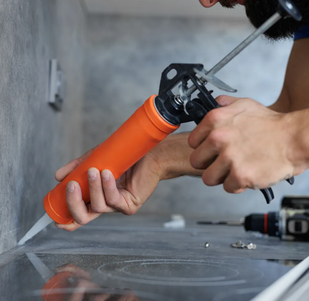 Kitchen remodeling contractor in Los Angeles CA installing cabinets and upgrading interior kitchen layout during renovation