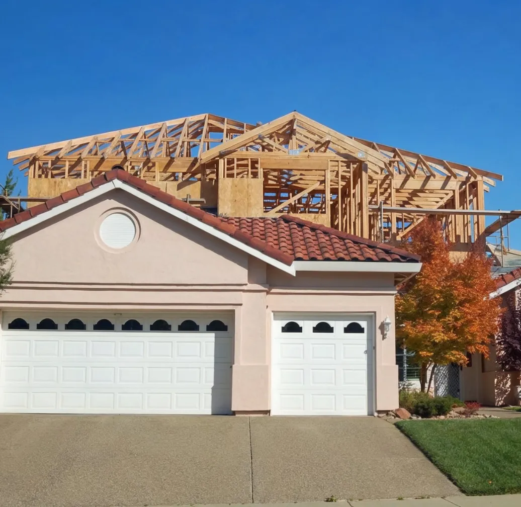 Room addition and home expansion project in Los Angeles CA with new structural framing and construction progress on residential property